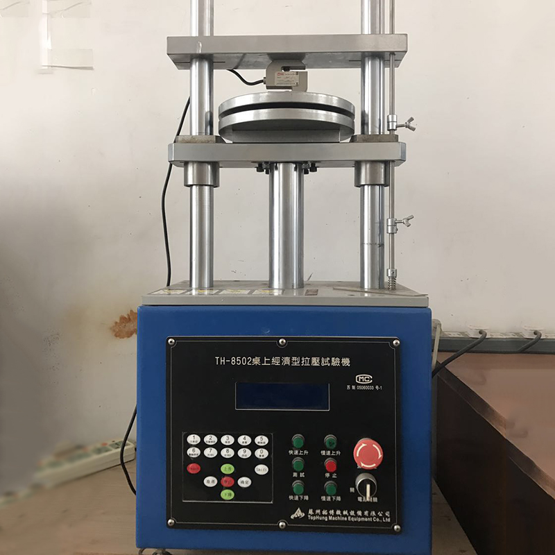 Spring pressure testing machine